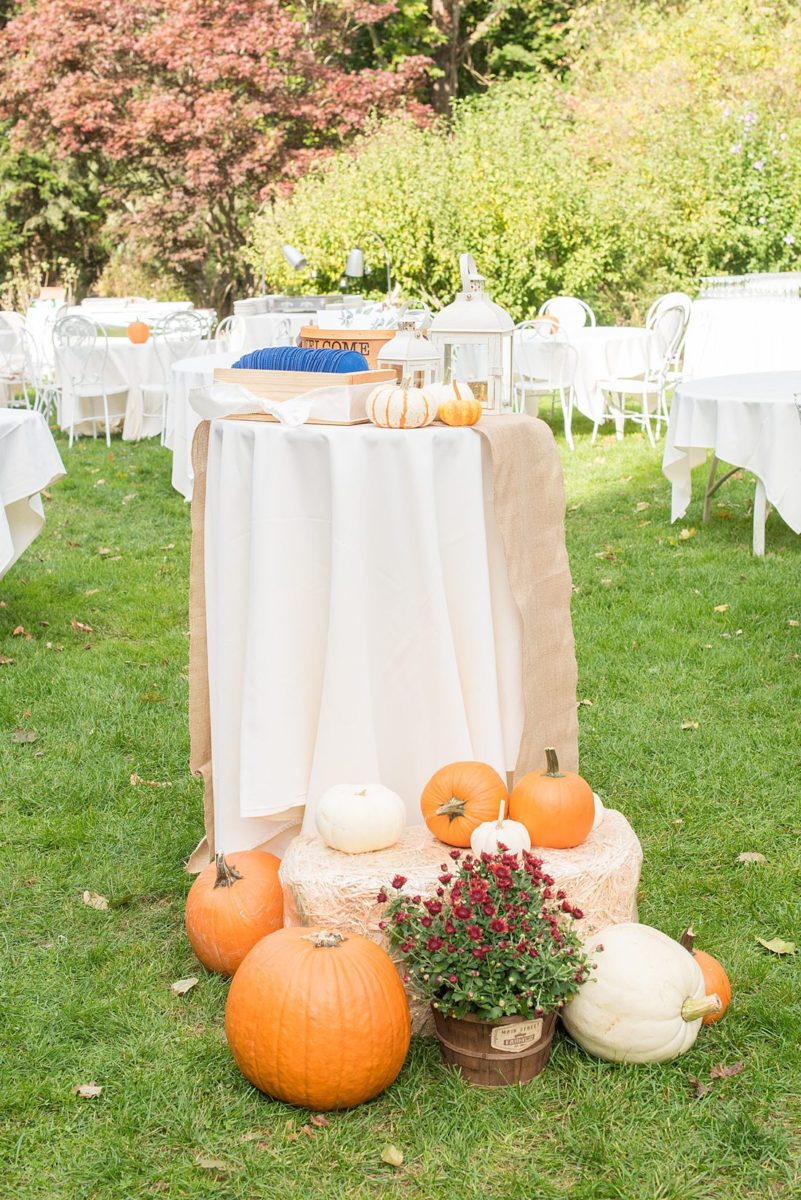 Fall wedding in upstate New York, just outside NYC, in Chappaqua, Westchester County. This bride and groom got married outdoors in a Jewish ceremony with a rabbi at Crabtree's Kittle House then celebrated inside for their reception. It was filled with pumpkins, autumn leaves, orange, white, peach and navy colors. Photos taken by Mikkel Paige Photography. #mikkelpaige #fallwedding #newyorkweddingvenues #nycweddingphotographer #outdoorceremony #welcometable #jewishceremony