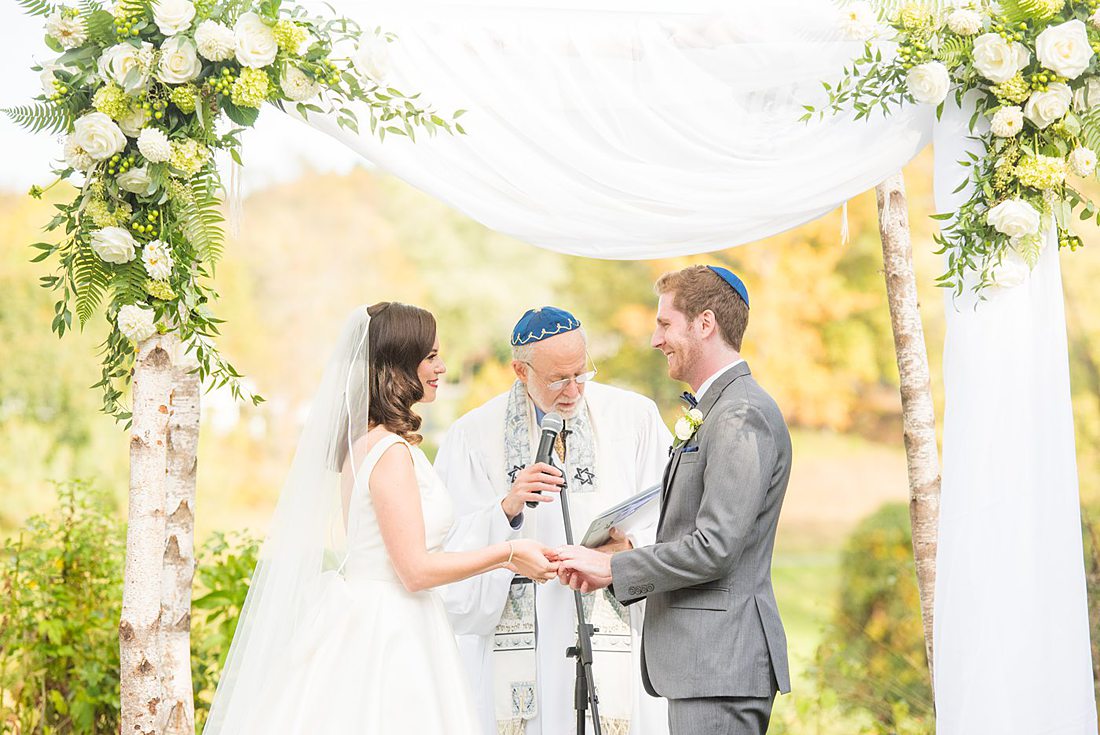 Fall wedding in upstate New York, just outside NYC, in Chappaqua, Westchester County. This bride and groom got married at Crabtree's Kittle House in an outdoor ceremony then celebrated inside for their reception. It was filled with pumpkins, autumn leaves, orange, white, peach and navy colors. Photos taken by Mikkel Paige Photography of their white gold diamond rings. #mikkelpaige #fallwedding #newyorkweddingvenues #upstatenewyorkweddingvenues #nycweddingphotographer #outdoorceremony