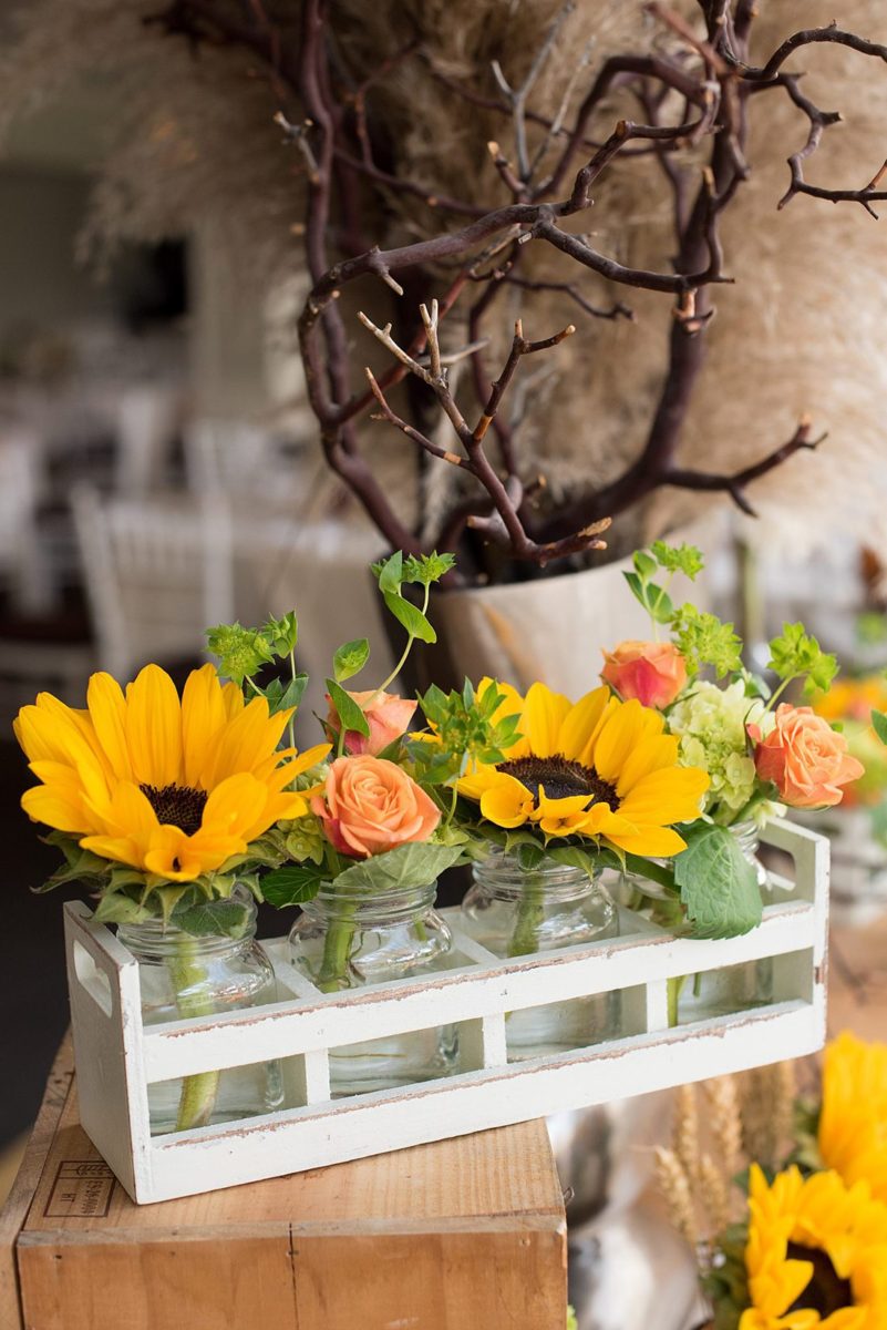 A fall wedding in upstate New York, just outside NYC, in Chappaqua, Westchester County. Photos taken by Mikkel Paige Photography at Crabtree's Kittle House. Ceremony outside and reception indoors, filled with custom carved pumpkins, autumn leaves, orange, white, and peach colors, berries, pears, pomegranates and sunflowers. #mikkelpaige #fallwedding #newyorkweddingvenues #nycweddingphotographer #outdoorceremony #autumnwedding #fallharvest