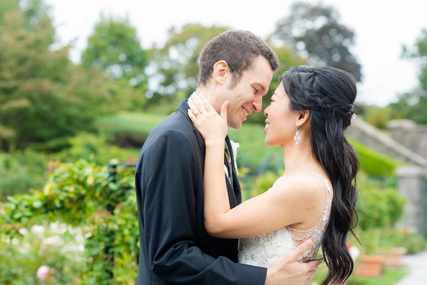 NYC wedding photos just outside Manhattan at New York Botanical Garden in the Bronx. This beautiful venue is great for an outdoor ceremony and indoor reception. Pictures by Mikkel Paige Photography. #NYCweddingvenue #NYCwedding #BronxBotanicalGarden #NYBotanicalGarden #mikkelpaige