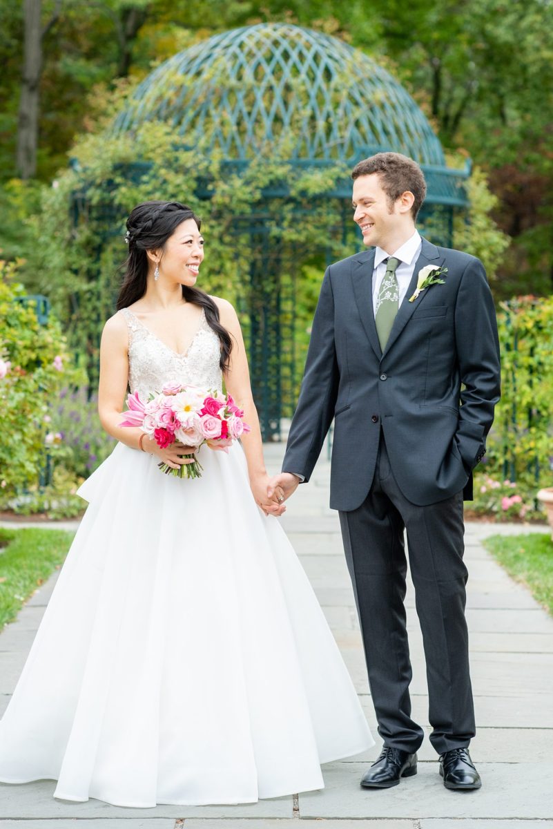 NYC wedding photos just outside Manhattan at New York Botanical Garden in the Bronx. This beautiful venue is great for an outdoor ceremony and indoor reception. Pictures by Mikkel Paige Photography. #NYCweddingvenue #NYCwedding #BronxBotanicalGarden #NYBotanicalGarden #mikkelpaige