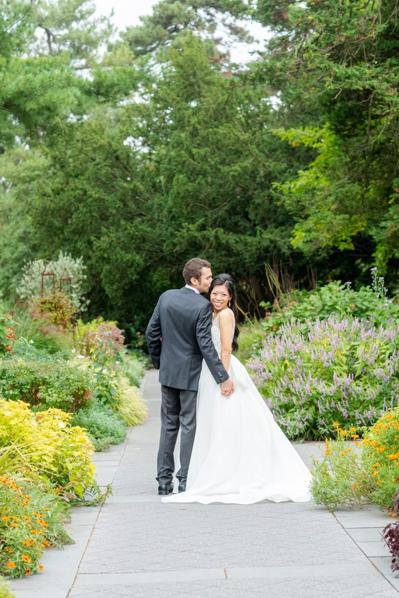 NYC wedding photos just outside Manhattan at New York Botanical Garden in the Bronx. This beautiful venue is great for an outdoor ceremony and indoor reception. Pictures by Mikkel Paige Photography. #NYCweddingvenue #NYCwedding #BronxBotanicalGarden #NYBotanicalGarden #mikkelpaige