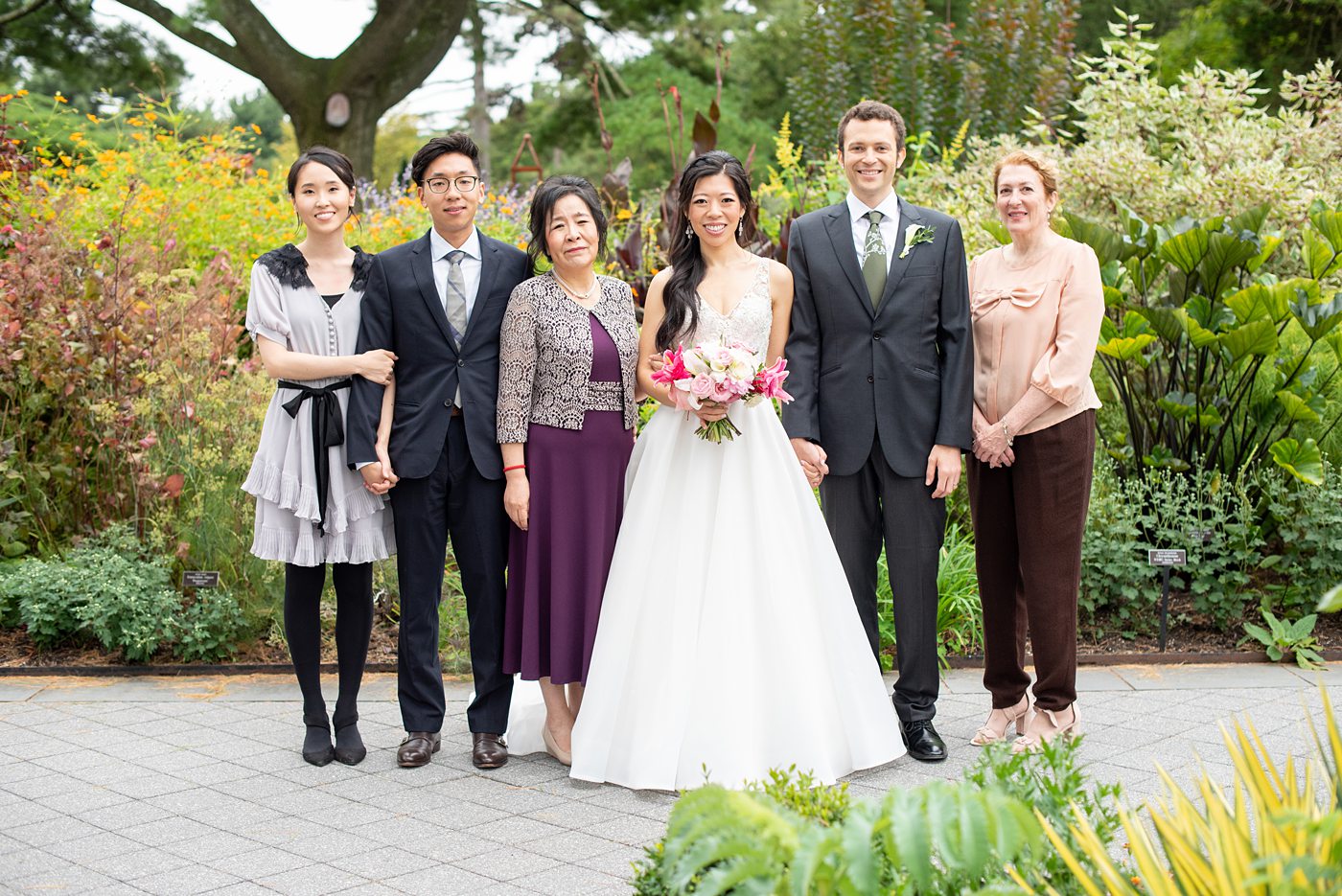 NYC wedding photos just outside Manhattan at New York Botanical Garden in the Bronx. This beautiful venue is great for an outdoor ceremony and indoor reception. Pictures by Mikkel Paige Photography. #NYCweddingvenue #NYCwedding #BronxBotanicalGarden #NYBotanicalGarden #mikkelpaige