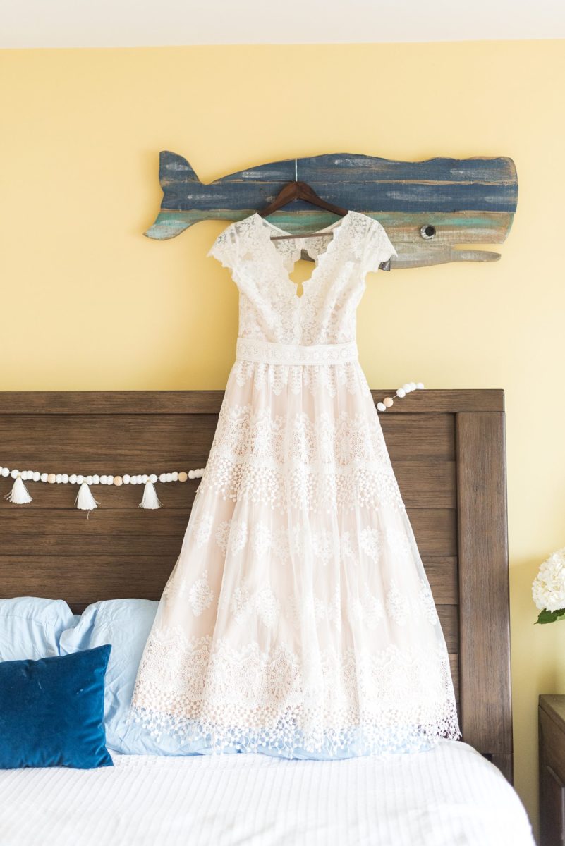 Saratoga Springs destination wedding photos in upstate New York by Mikkel Paige Photography, NY wedding photographer. The bride wore a boho lace gown an intimate wedding at a home. #mikkelpaige #saratogaspringswedding #destinationwedding #bridestyle #bohobride