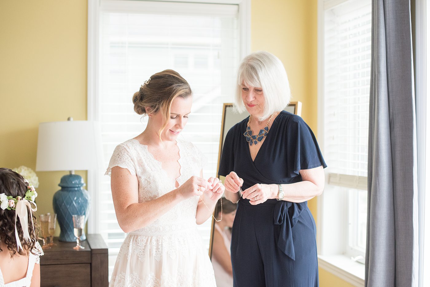 Saratoga Springs destination wedding photos in upstate New York by Mikkel Paige Photography, NY wedding photographer. The bride wore a boho lace gown an intimate wedding at a home and her mother helped her get ready for her day. #mikkelpaige #saratogaspringswedding #destinationwedding #bridestyle #bohobride #motherofthebride