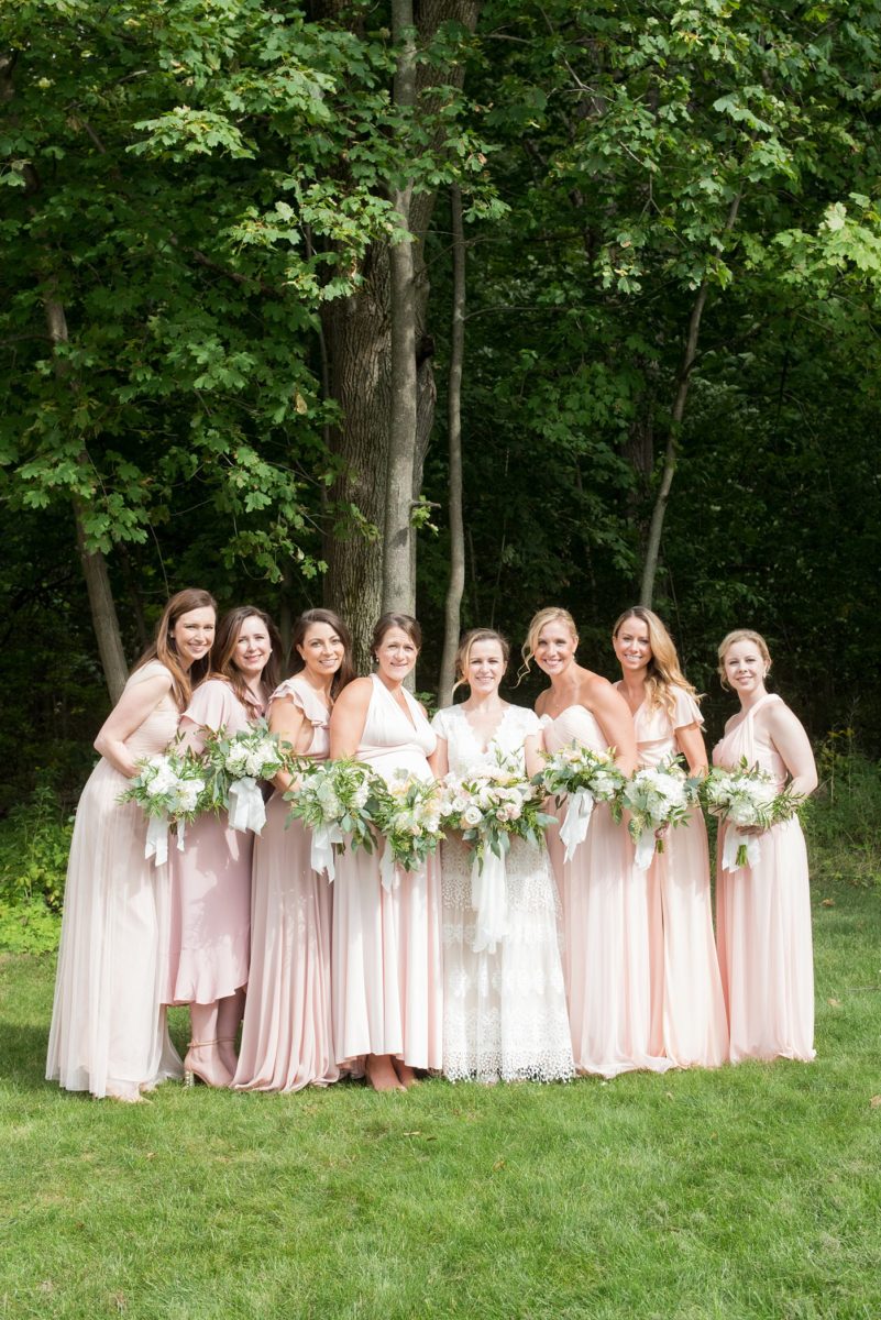 Saratoga Springs destination wedding photos in upstate New York by Mikkel Paige Photography, NY wedding photographer. The bridesmaids wore pink chiffon gowns. #mikkelpaige #saratogaspringswedding #destinationwedding #pinkbridesmaids #whiteandpinkbouquets