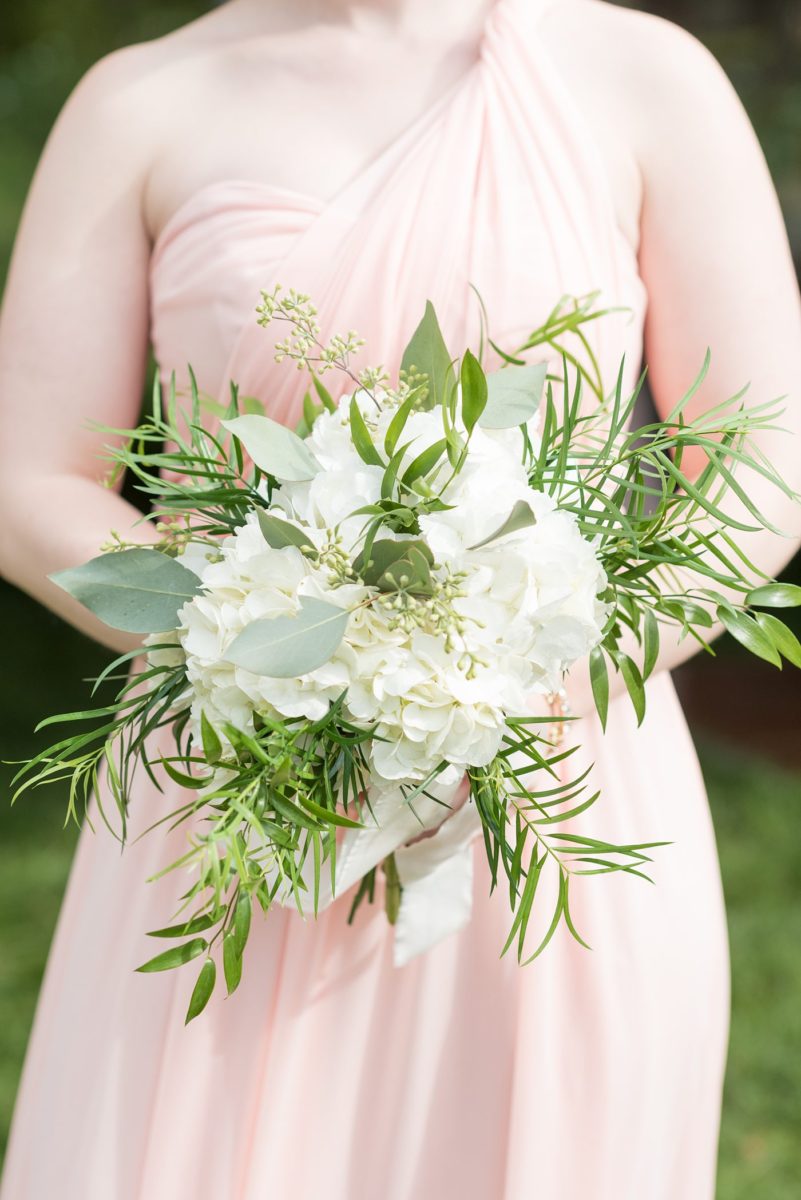 Saratoga Springs destination wedding photos in upstate New York by Mikkel Paige Photography, NY wedding photographer. The bridesmaids carried white hydrangea and eucalyptus bouquets. #mikkelpaige #saratogaspringswedding #destinationwedding #lakefrontwedding #lakewedding #bridesmaids #eucalyptusbouquet #hydrangeabouquet