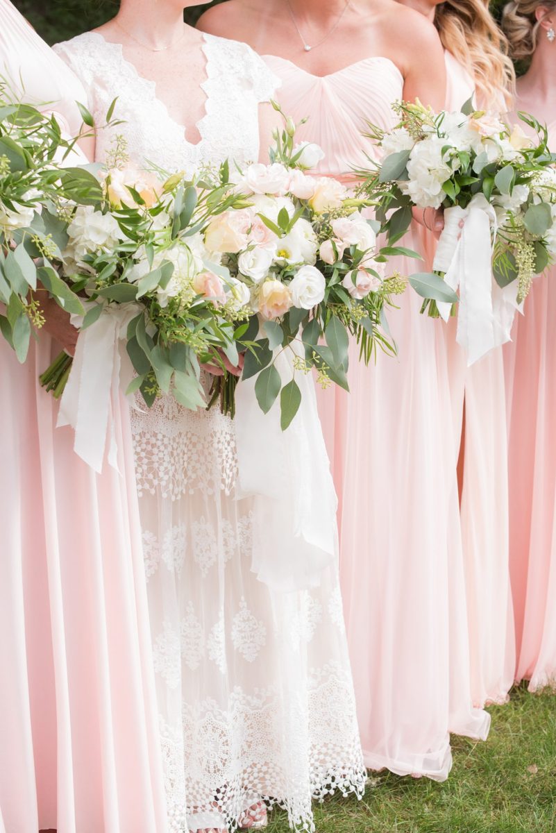 Saratoga Springs destination wedding photos in upstate New York by Mikkel Paige Photography, NY wedding photographer. The bridesmaids carried white hydrangea and eucalyptus bouquets. #mikkelpaige #saratogaspringswedding #destinationwedding #lakefrontwedding #lakewedding #bridesmaids #eucalyptusbouquet #hydrangeabouquet