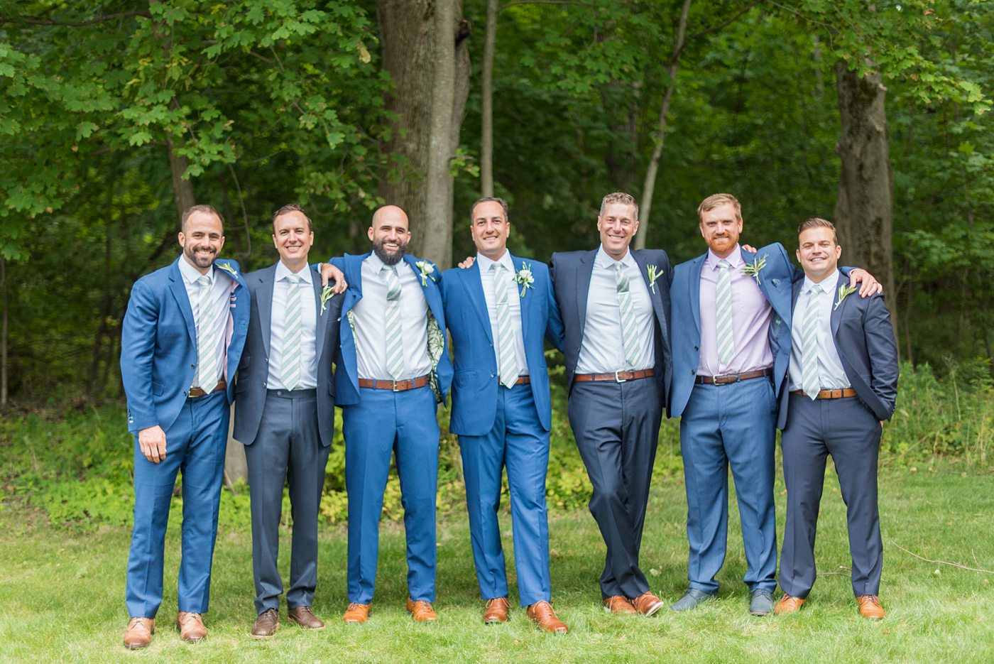 Saratoga Springs destination wedding photos in upstate New York by Mikkel Paige Photography, NY wedding photographer. The groomsmen wore navy blue suits and bridesmaids wore pink gowns. #mikkelpaige #saratogaspringswedding #destinationwedding #pinkbridesmaids #bluesuits