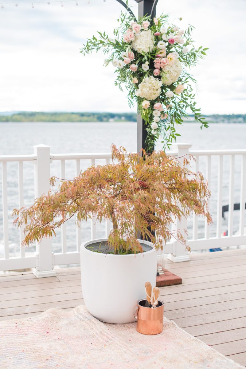 Saratoga Springs destination wedding photos in upstate New York by Mikkel Paige Photography, NY wedding photographer. The bride and groom were married in an intimate wedding at a home with a lakefront ceremony with Native American traditions. They had their dogs by their side as part of the ceremony! #mikkelpaige #saratogaspringswedding #destinationwedding #lakefrontwedding #waterfrontwedding #lakewedding