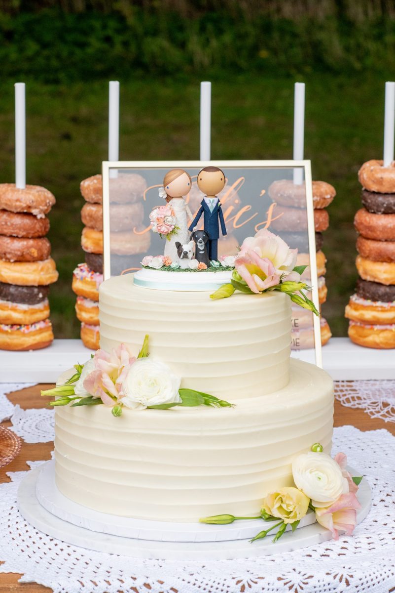 Saratoga Springs destination wedding photos in upstate New York by Mikkel Paige Photography, NY wedding photographer. The buttercream cake had a wooden people custom cake topper from Etsy for the bride, groom and their two dogs. #mikkelpaige #saratogaspringswedding #destinationwedding #customcaketopper #weddingdogs