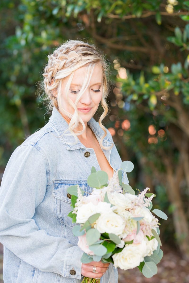 Chatham Station wedding photos my Mikkel Paige Photography from this urban chic beautiful venue in Cary, North Carolina. The bride wore a denim jacket with "bride" on the back for her wedding fall celebration. #mikkelpaige #RaleighWeddingphotographer #chathamstation #CaryNC #weddingvenues #bridestyle #bridaljacket #bridedenimjacket