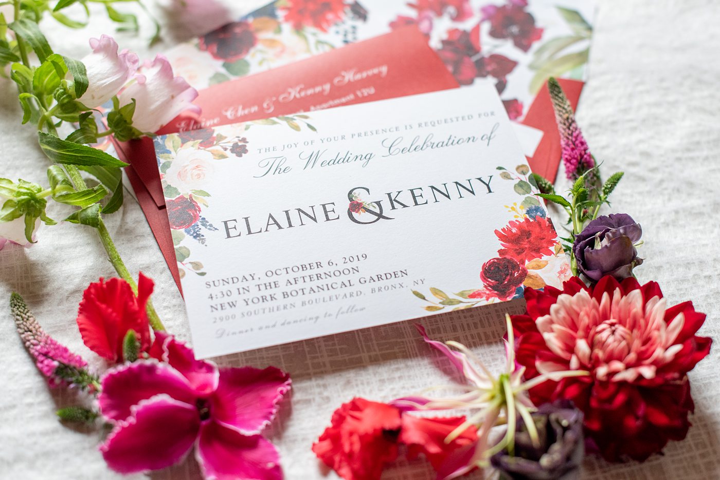 New York Botanical Garden wedding photos by Mikkel Paige Photography. The couple had red inspired details and an invitation to match. After the couple's engagement photoshoot in Manhattan I was so excited for their fall wedding near the Conservatory at the Terrace Room, at this NYC venue. #mikkelpaige #nybg #asianbride #redweddinginvitation #brideandgroom #newyorkbotanicalgardenwedding #NYBotanicalGarden #Bronxwedding #newyorkcityweddingvenue #weddingstationery #detailphotos