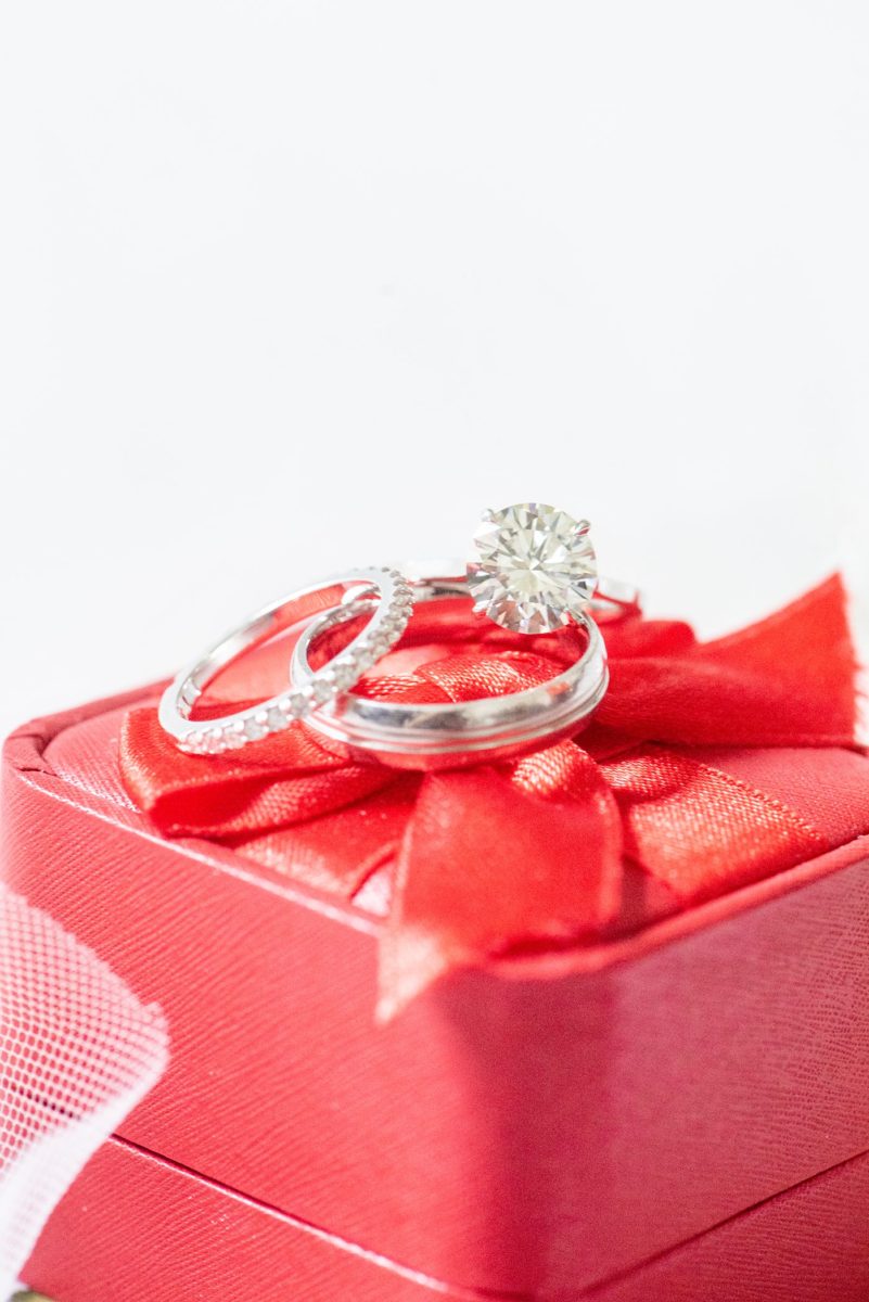 New York Botanical Garden wedding photos by Mikkel Paige Photography. The bride and groom had white gold and diamond wedding rings. After the couple's engagement photoshoot in Manhattan I was so excited for their fall wedding near the Conservatory at the Terrace Room, at this NYC venue. #mikkelpaige #nybg #asianbride #redweddinginvitation #weddingshoes #newyorkbotanicalgardenwedding #NYBotanicalGarden #Bronxwedding #newyorkcityweddingvenue #bridestyle #detailphotos #weddingrings