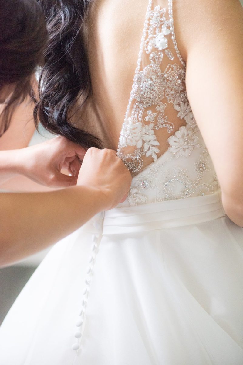 New York Botanical Garden wedding photos by Mikkel Paige Photography. After the couple's engagement photoshoot in Manhattan I was so excited for their fall wedding near the Conservatory at the Terrace Room, at this NYC venue. The bride wore a beaded ballgown dress. with half up braided hair do and big bow on her back before the train. #bridestyle #mikkelpaige #nybg #newyorkbotanicalgardenwedding #asianbride #NYBotanicalGarden #Bronxwedding