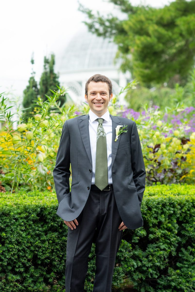 New York Botanical Garden wedding photos by Mikkel Paige Photography. The groom wore a green tie with floral detail. After the couple's engagement photoshoot in Manhattan I was so excited for their fall wedding near the Conservatory at the Terrace Room, at this NYC venue. #mikkelpaige #nybg #newyorkbotanicalgardenwedding #groomstyle #NYBotanicalGarden #Bronxwedding 