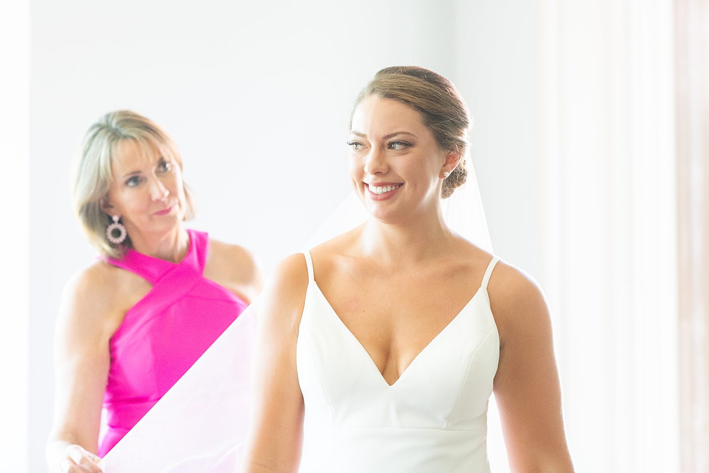 Photos by Mikkel Paige Photography at Waveny House wedding venue in New Canaan, Connecticut. This beautiful venue has an outdoor garden for the ceremony and indoor historic home for the reception. The bride got ready in the main house with her mother and bridesmaids. #mikkelpaige #wavenyhouse #wavenyhousewedding #connecticutweddingvenue #connecticutweddingphotographer #gettingready