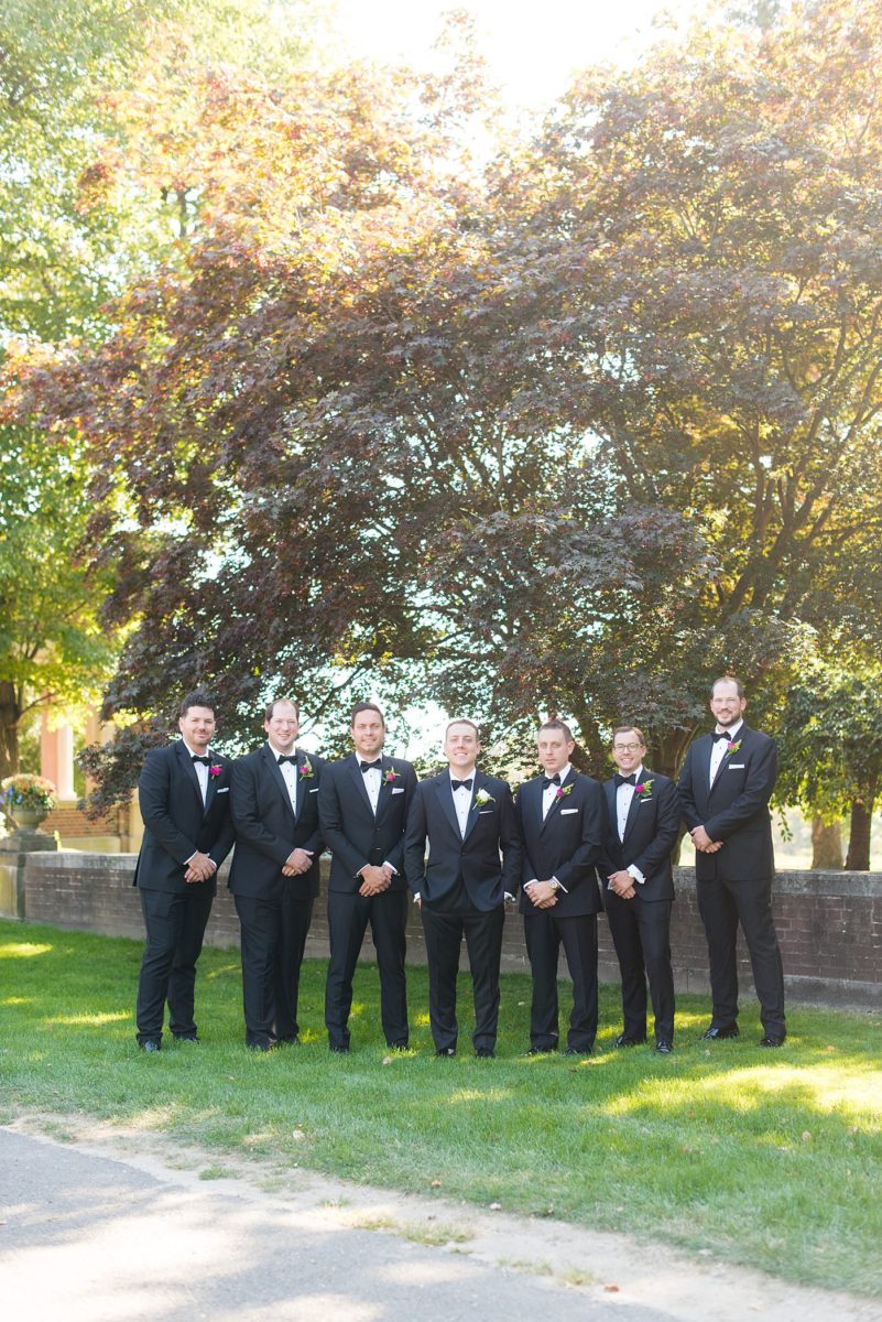 Photos by Mikkel Paige Photography at Waveny House wedding venue in New Canaan, Connecticut. This beautiful venue has an outdoor garden for the ceremony and indoor historic home for the reception. The groom and groomsmen wore black tuxedos with rose boutonnieres. #mikkelpaige #wavenyhouse #wavenyhousewedding #connecticutweddingvenue #connecticutweddingphotographer #weddingparty #groomsmen #blacktuxedos