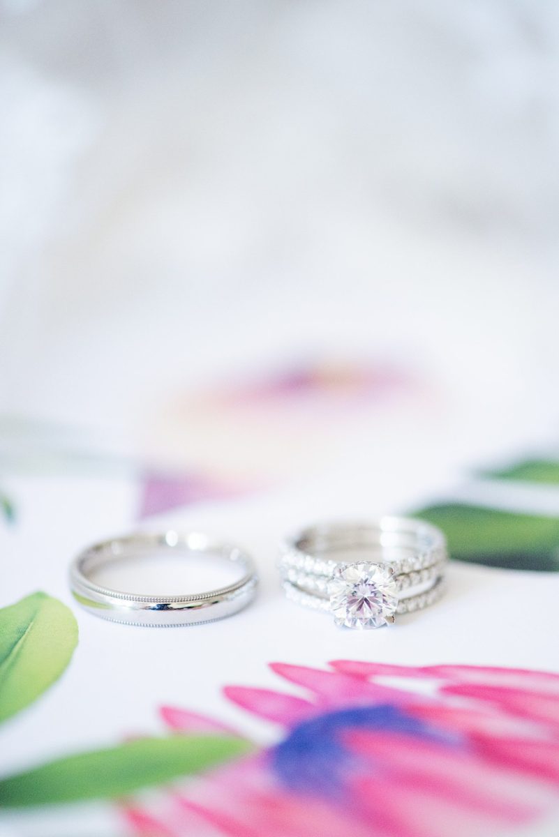 Detail ring photos by Mikkel Paige Photography at Waveny House wedding venue in New Canaan, Connecticut. This beautiful venue has an outdoor garden for the ceremony and indoor historic home for the reception. The bride and groom wore white gold and diamond engagement ring and wedding bands. #mikkelpaige #wavenyhouse #wavenyhousewedding #connecticutweddingvenue #connecticutweddingphotographer #diamondrings #weddingrings #ringshot #detailshots