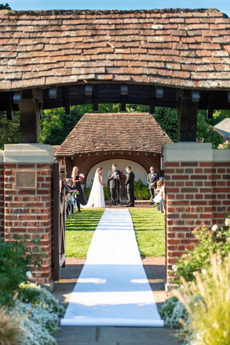 Photos by Mikkel Paige Photography at Waveny House wedding venue in New Canaan, Connecticut. This beautiful venue has an outdoor garden for the ceremony and indoor historic home for the reception. The bride and groom were married in a garden outside and had a bubble exit. #mikkelpaige #wavenyhouse #wavenyhousewedding #connecticutweddingvenue #connecticutweddingphotographer #outdoorceremony #gardenceremony #bubbleexit