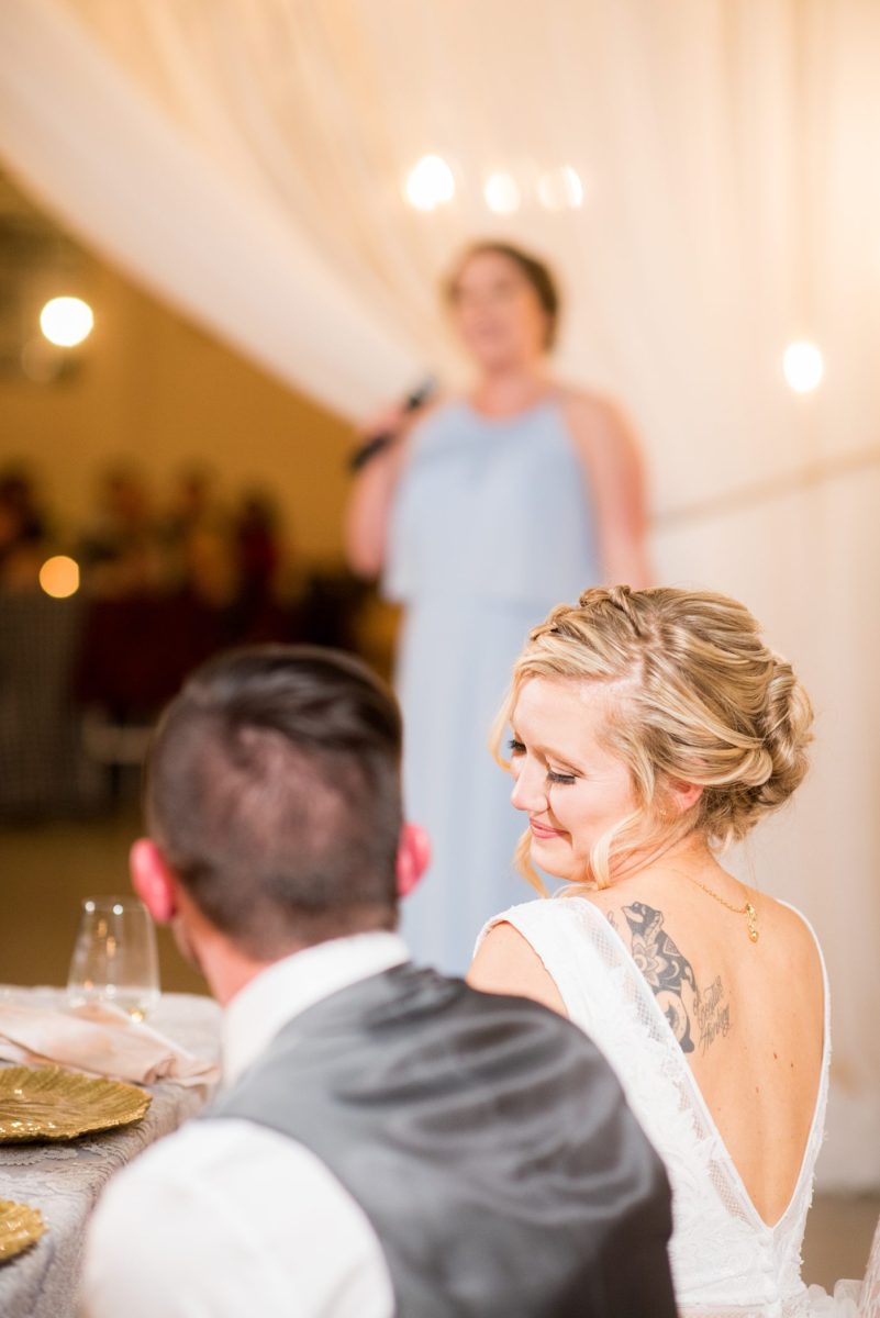 Fall photos at Cary, North Carolina wedding venue Chatham Station by Mikkel Paige Photography. This urban, beautiful space has an indoor and outdoor space near Raleigh. A DJ played as guests looked on during their reception. #mikkelpaige #RaleighWeddingPhotographer #NorthCarolinaWeddings #SouthernWeddings #fallwedding #RaleighWedding #CaryNorthCarolina