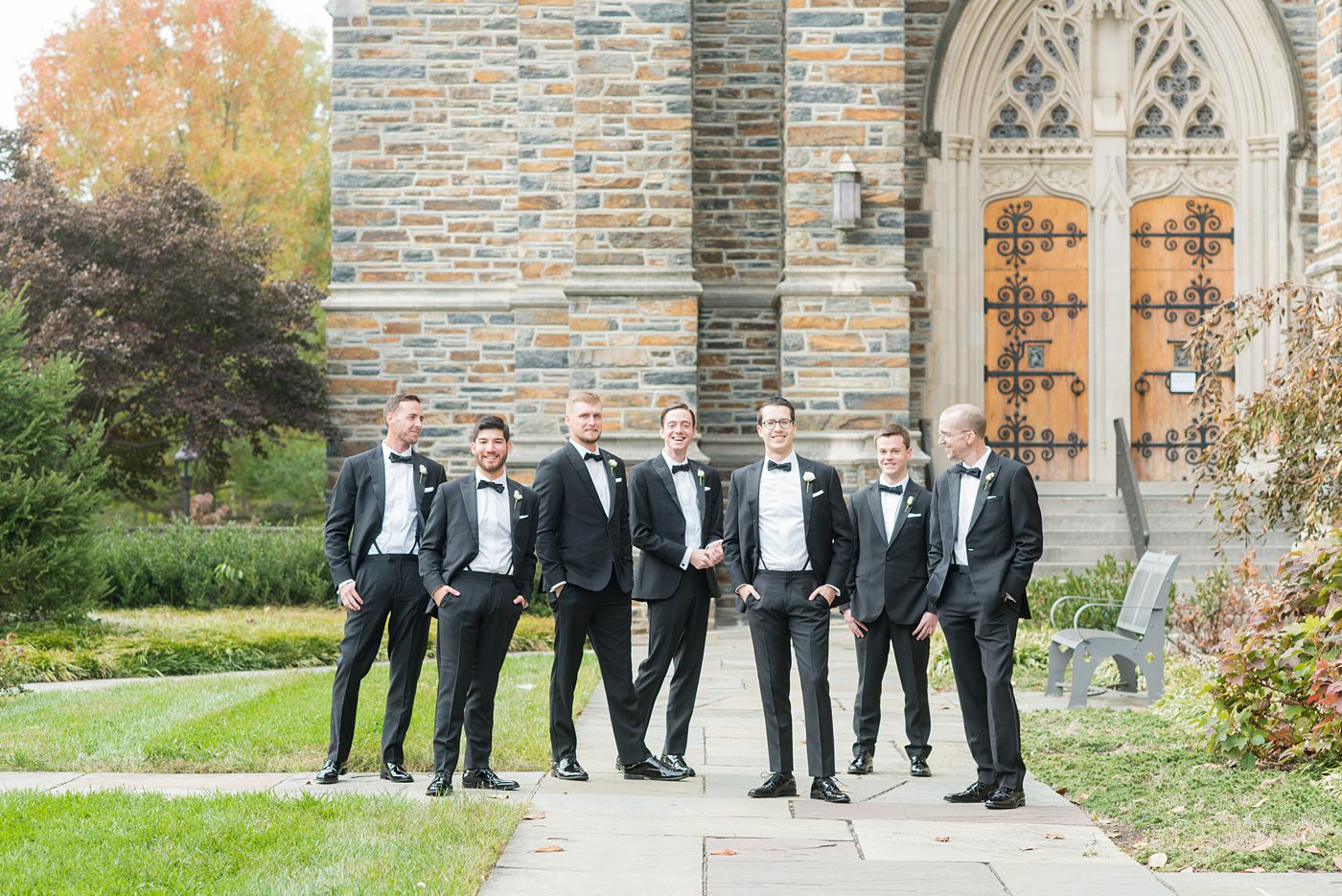 Wedding photographer Mikkel Paige Photography captures a ceremony at Duke Chapel and reception at The Rickhouse, a beautiful downtown venue in Durham, North Carolina. The groom and groomsmen wore classic black tuxedos. #durhamweddingphotographer #DukeChapelWedding #DurhamWeddingNorthCarolina #DurhamWeddingPhotographer #MikkelPaige #groomstyle #groomsmen