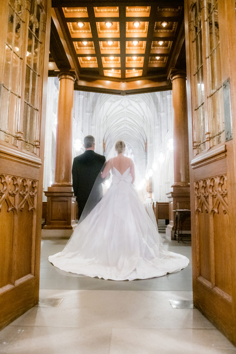 Wedding photographer Mikkel Paige Photography captures a ceremony at Duke Chapel and reception at The Rickhouse, a beautiful downtown venue in Durham, North Carolina. The father of the bride walked his daughter down the aisle at the iconic chapel, reminiscent of a European gothic church. #durhamweddingphotographer #DukeChapelWedding #DurhamWeddingNorthCarolina #DurhamWeddingPhotographer #MikkelPaige #weddingceremony #FatheroftheBride