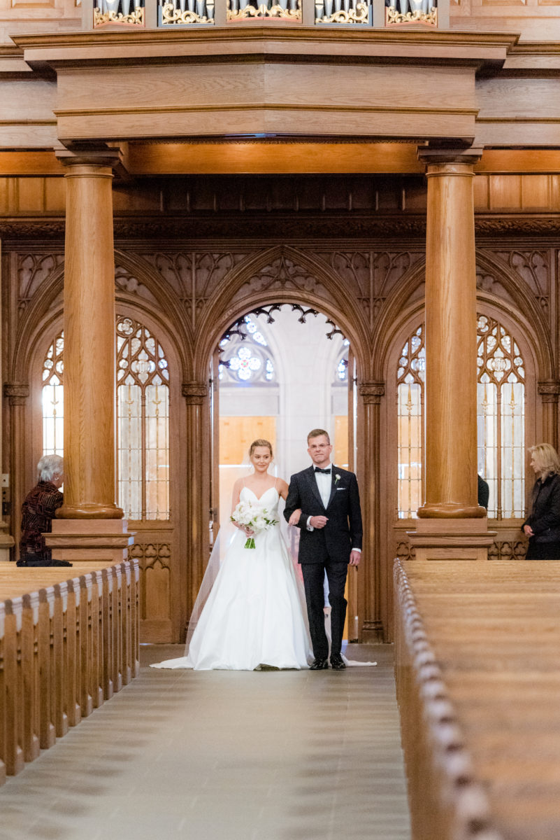 Wedding photographer Mikkel Paige Photography captures a ceremony at Duke Chapel and reception at The Rickhouse, a beautiful downtown venue in Durham, North Carolina. The father of the bride walked his daughter down the aisle at the iconic chapel, reminiscent of a European gothic church. #durhamweddingphotographer #DukeChapelWedding #DurhamWeddingNorthCarolina #DurhamWeddingPhotographer #MikkelPaige #weddingceremony #FatheroftheBride