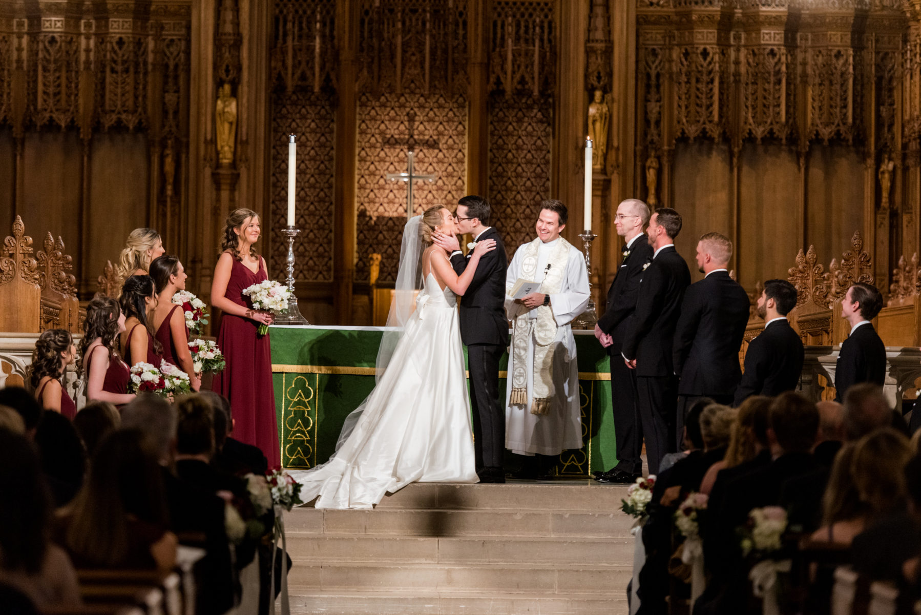 Wedding photographer Mikkel Paige Photography captures a ceremony at Duke Chapel and reception at The Rickhouse, a beautiful downtown venue in Durham, North Carolina. The bride and groom recited vows at the iconic chapel, reminiscent of a European gothic church. #durhamweddingphotographer #DukeChapelWedding #DurhamWeddingNorthCarolina #DurhamWeddingPhotographer #MikkelPaige #weddingceremony