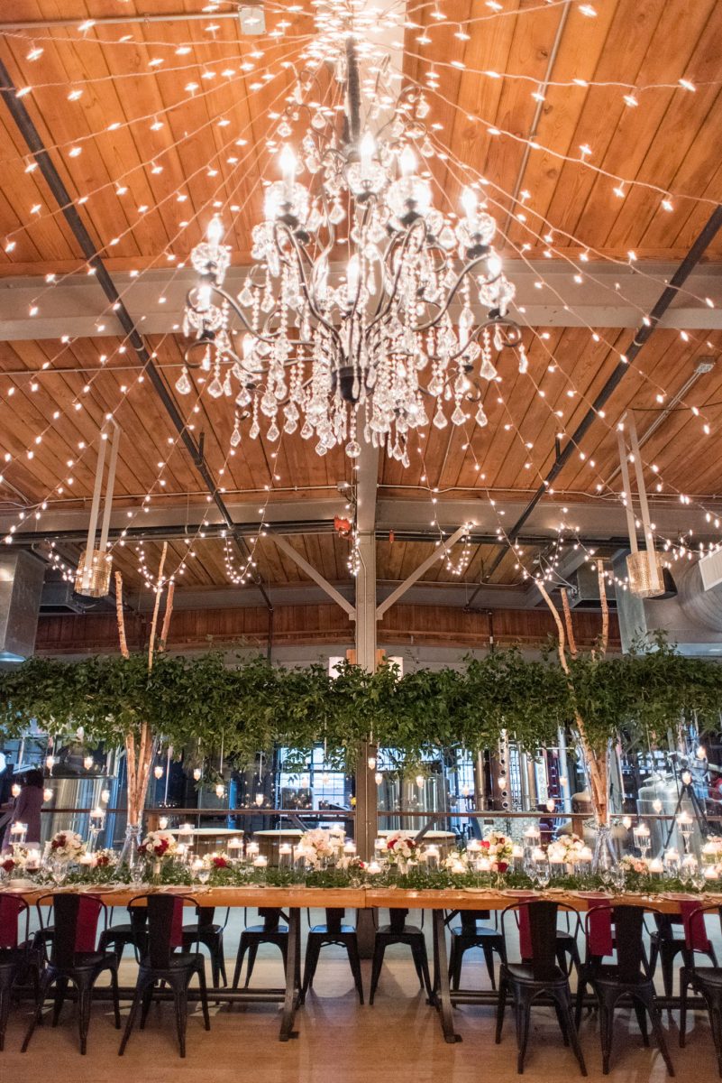 Wedding photographer Mikkel Paige Photography captures a ceremony at Duke Chapel and reception at The Rickhouse, a beautiful downtown Durham, North Carolina. The venue was filled with candlelight and greenery for a maroon and gold color palette wedding. #DukeChapelWedding #DurhamWeddingNorthCarolina #DurhamWeddingPhotographer #MikkelPaige #maroonwedding #fallwedding