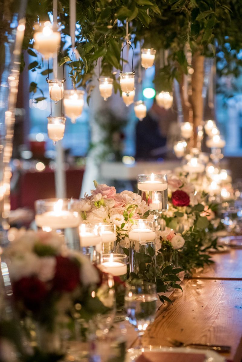 Wedding photographer Mikkel Paige Photography captures a ceremony at Duke Chapel and reception at The Rickhouse, a beautiful downtown Durham, North Carolina. The venue was filled with candlelight and greenery for a maroon and gold color palette wedding. #DukeChapelWedding #DurhamWeddingNorthCarolina #DurhamWeddingPhotographer #MikkelPaige #maroonwedding #fallwedding