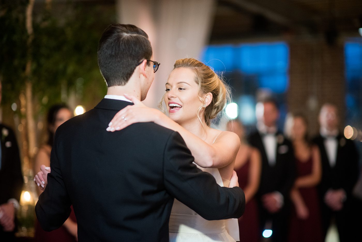 Wedding photographer Mikkel Paige Photography captures a ceremony at Duke Chapel and reception at The Rickhouse, a beautiful downtown Durham, North Carolina. The venue was filled with candlelight and greenery for a maroon and gold color palette wedding. #DukeChapelWedding #DurhamWeddingNorthCarolina #DurhamWeddingPhotographer #MikkelPaige #maroonwedding #fallwedding