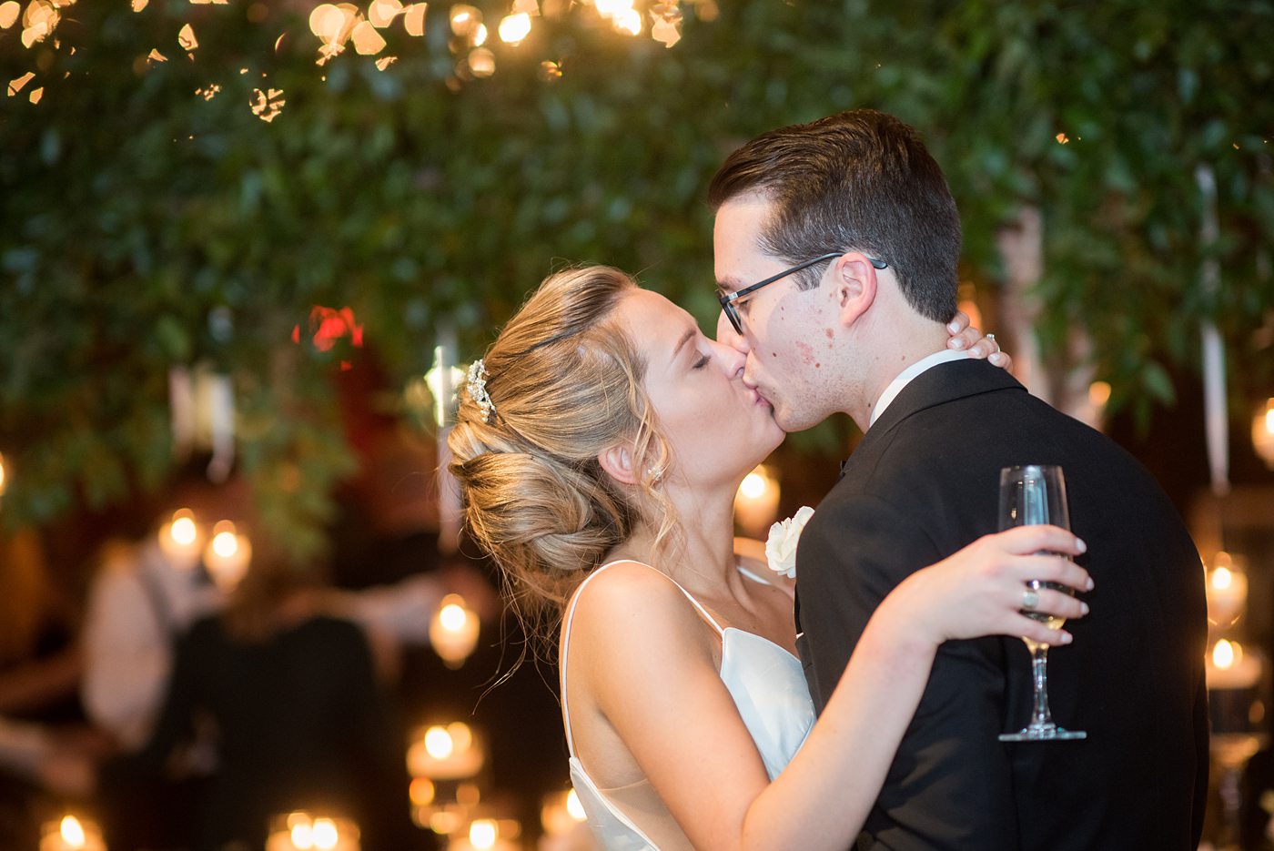 Wedding photographer Mikkel Paige Photography captures a ceremony at Duke Chapel and reception at The Rickhouse, a beautiful downtown Durham, North Carolina. The venue was filled with candlelight and greenery for a maroon and gold color palette wedding. #DukeChapelWedding #DurhamWeddingNorthCarolina #DurhamWeddingPhotographer #MikkelPaige #maroonwedding #fallwedding