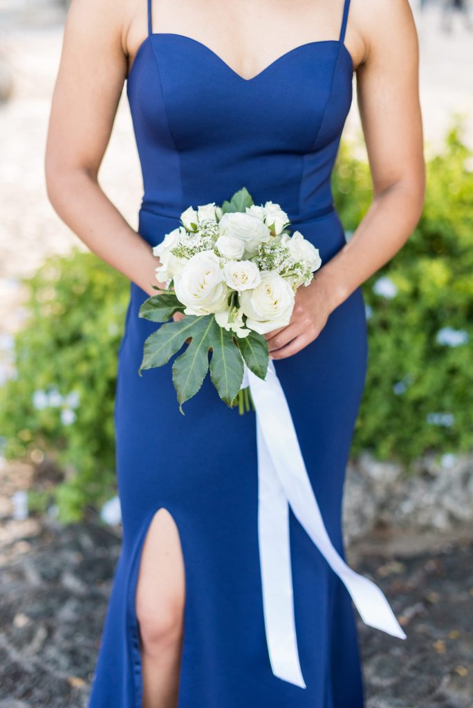 Casa de Campo wedding photos of the bridesmaid's bouquet during their first look in the Dominican Republic by Mikkel Paige Photography.