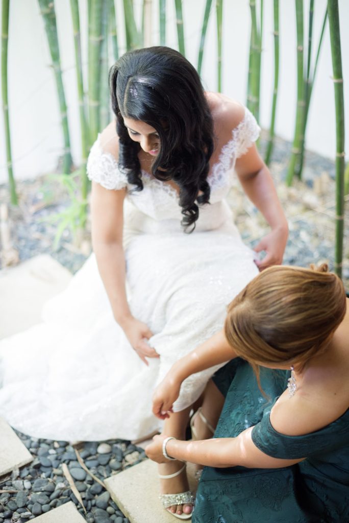 Casa de Campo wedding photos in the Dominican Republic with outdoor ceremony. Pictures of the bride getting ready by Mikkel Paige Photography.