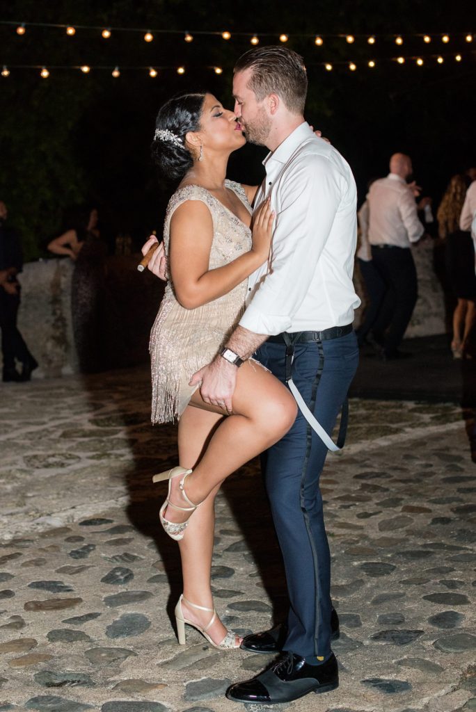 Casa de Campo wedding photos in the Dominican Republic with outdoor ceremony. Pictures of the bride and groom at the reception by Mikkel Paige Photography.