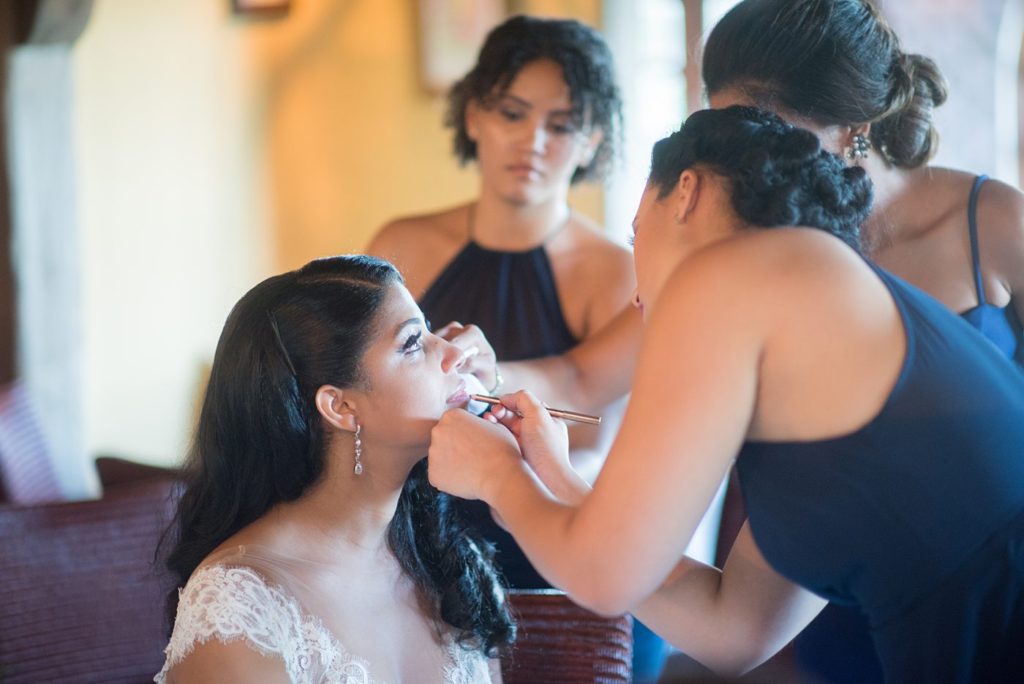 Casa de Campo wedding photos in the Dominican Republic with outdoor ceremony. Pictures of the bride getting ready by Mikkel Paige Photography.