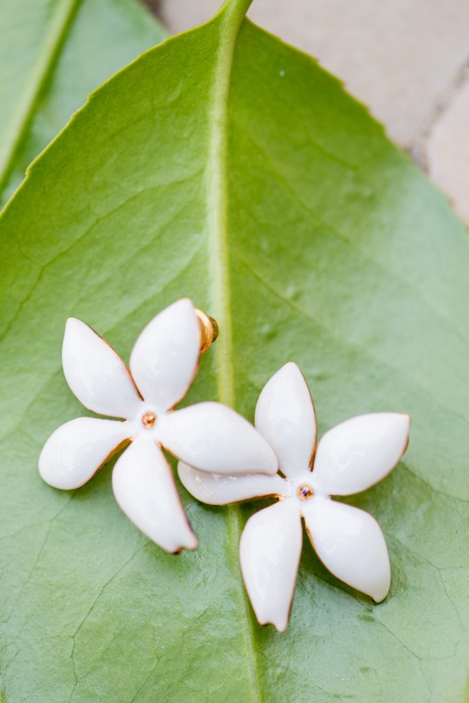 Bride enamel designer earring details for her destination wedding first look at a California winery in Los Gatos called Testarossa. Photos by Mikkel Paige Photography.