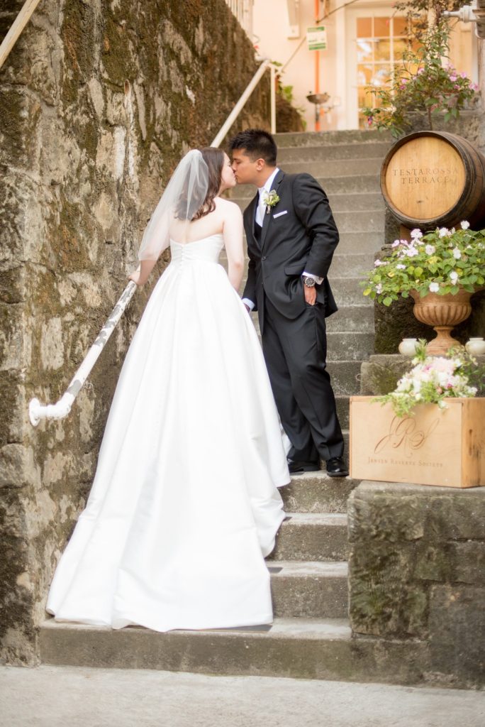 A destination wedding picture with the bride and groom at a California winery in Los Gatos called Testarossa. Photos by Mikkel Paige Photography.