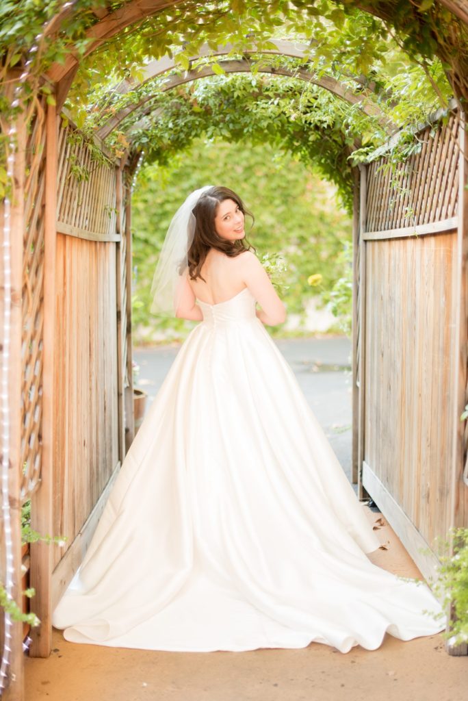 A destination wedding picture with the bride at a California winery in Los Gatos called Testarossa. Photos by Mikkel Paige Photography.