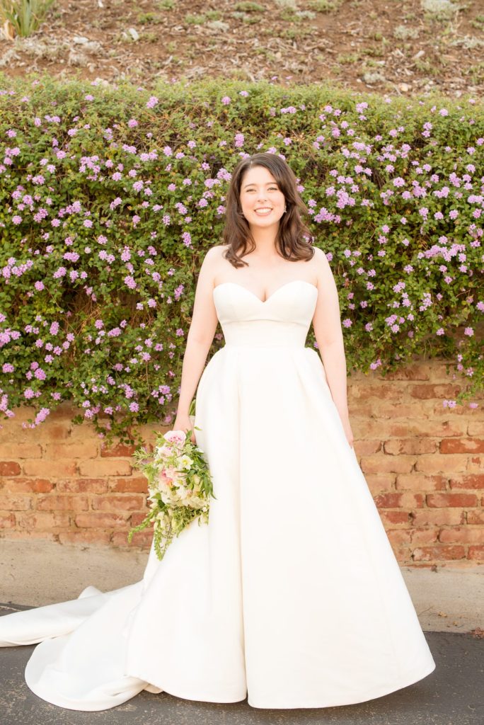 A destination wedding picture with the bride at a California winery in Los Gatos called Testarossa. Photos by Mikkel Paige Photography.