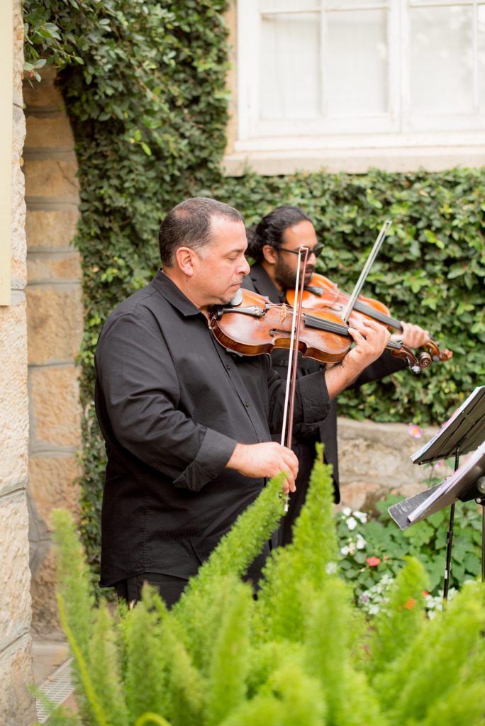 A destination wedding picture of the welcome quartet at a California winery in Los Gatos called Testarossa. Photos by Mikkel Paige Photography.