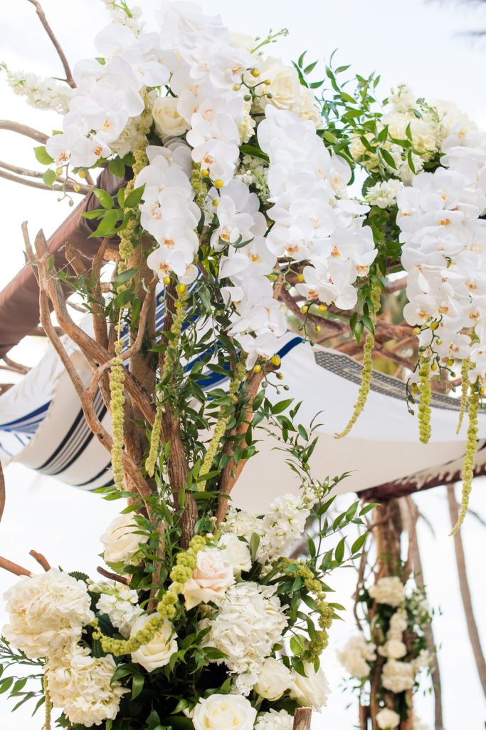 Eau Palm Beach Florida Destination Wedding photos by Mikkel Paige Photography. The Jewish ceremony was held by the pool overlooking the ocean.