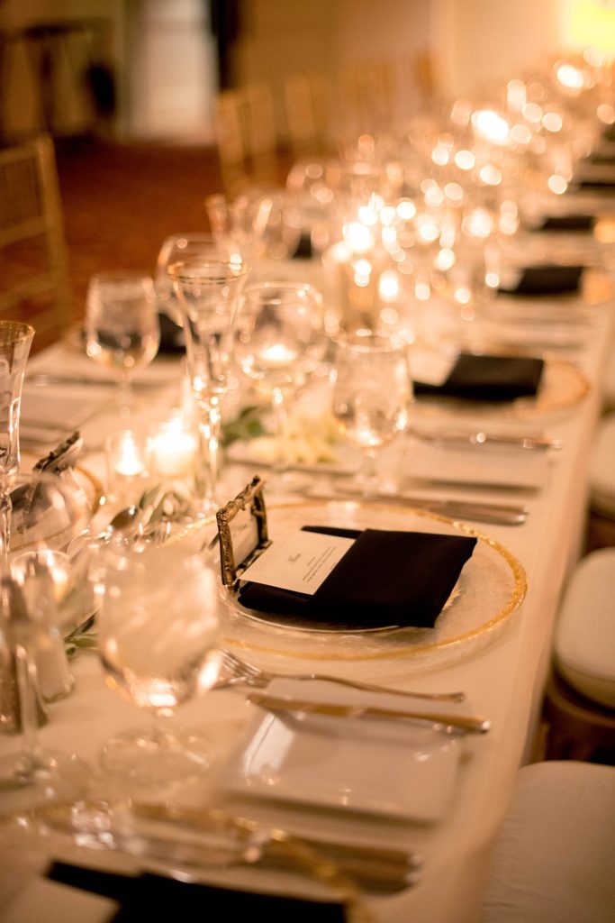 Estancia La Jolla wedding photos of the reception table and glasses with destination photographer Mikkel Paige Photography.