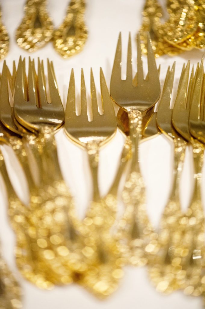 Heirloom gold flatware from a small Brooklyn wedding in NYC during fall with photos by Mikkel Paige Photography. The celebration was held at the bride and groom's apartment across the street.
