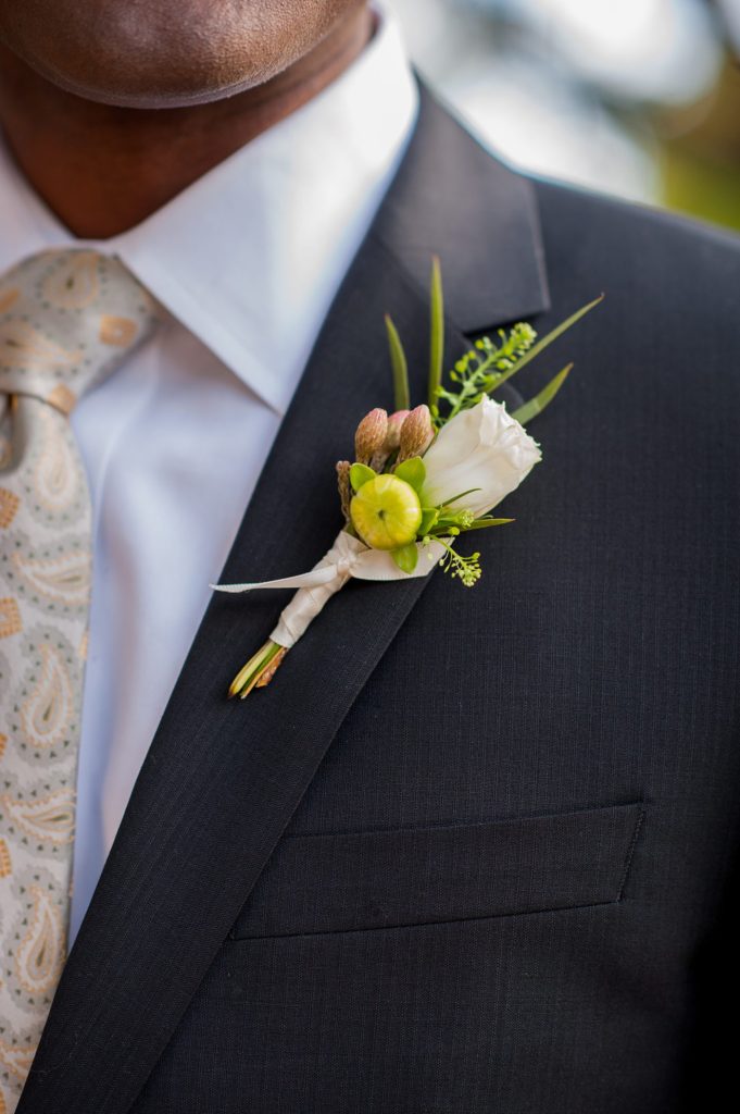 A fall boutonniere for the groom for a small Brooklyn wedding in NYC during fall with photos by Mikkel Paige Photography.
