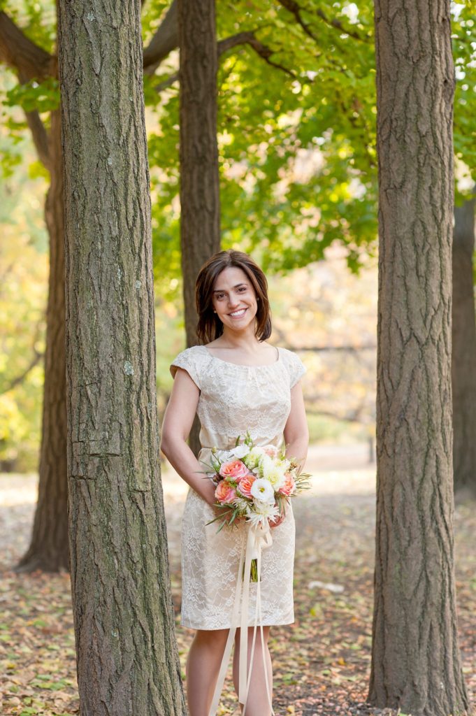 A bride during her small Brooklyn wedding elopement in NYC during Fall. Photos by Mikkel Paige Photography with a ceremony held at Fort Greene Park.