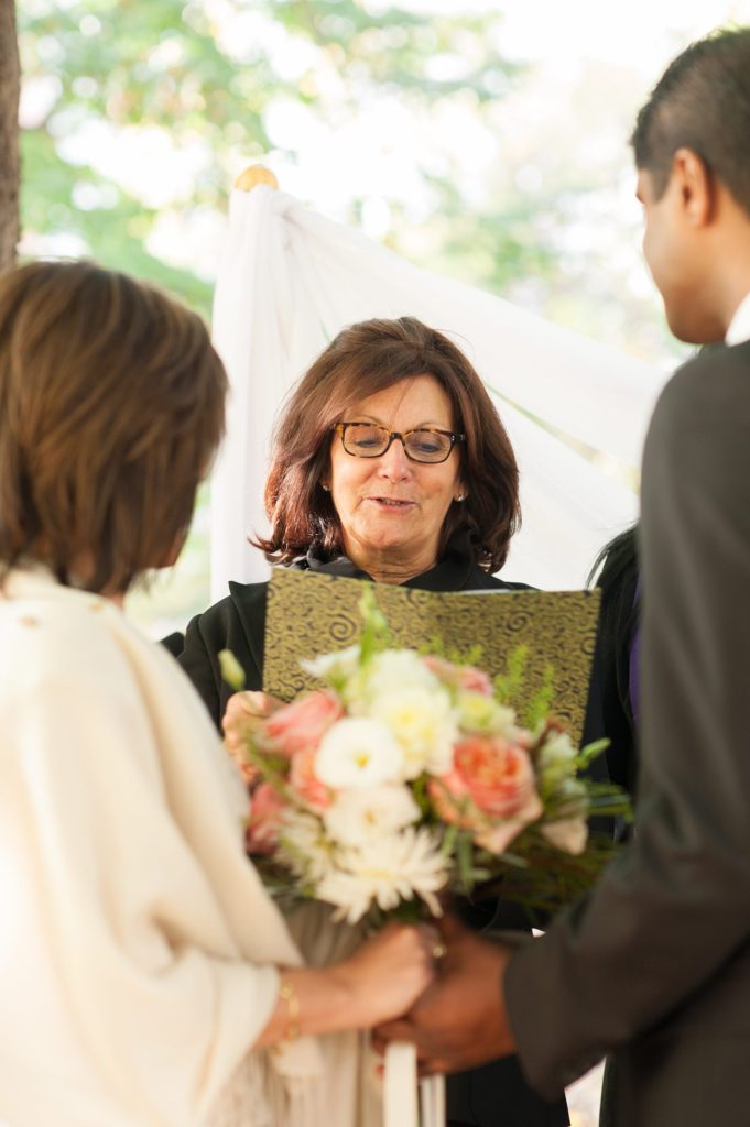 A small Brooklyn wedding elopement in NYC during Fall. Photos by Mikkel Paige Photography with a ceremony held at Fort Greene Park.
