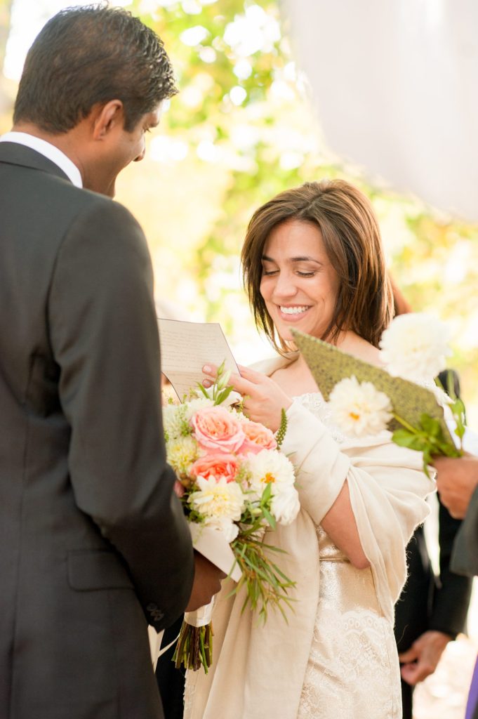 Vows exchanged during a small Brooklyn wedding elopement in NYC during Fall. Photos by Mikkel Paige Photography with a ceremony held at Fort Greene Park.
