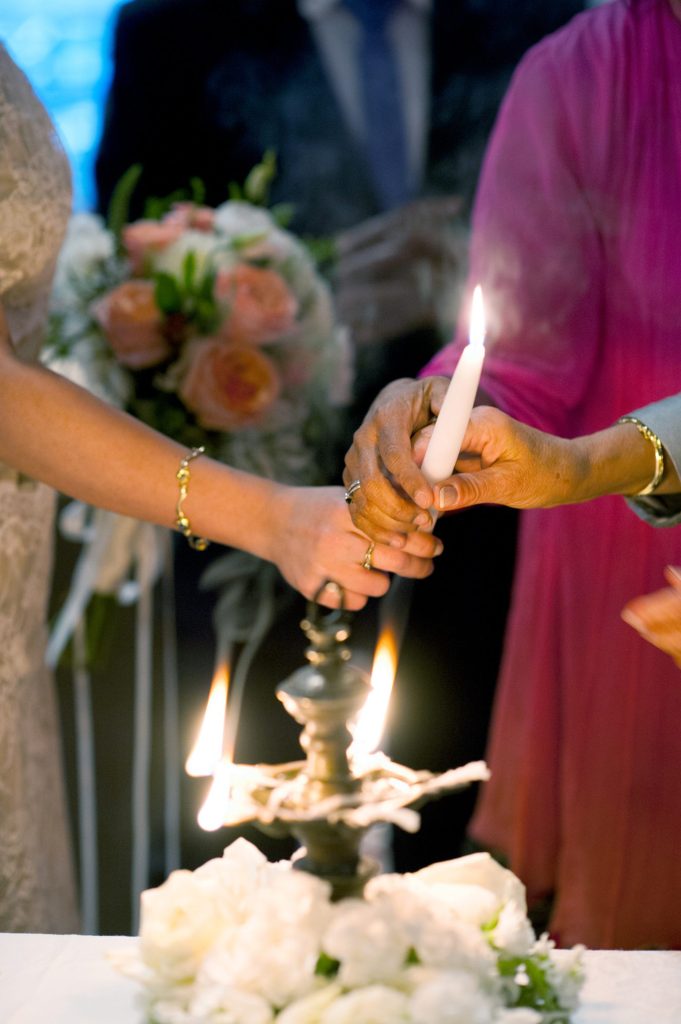 Indian cultural traditions during a small Brooklyn wedding elopement in NYC during Fall. Photos by Mikkel Paige Photography with a ceremony held at Fort Greene Park and reception at the couple's apartment across the street.